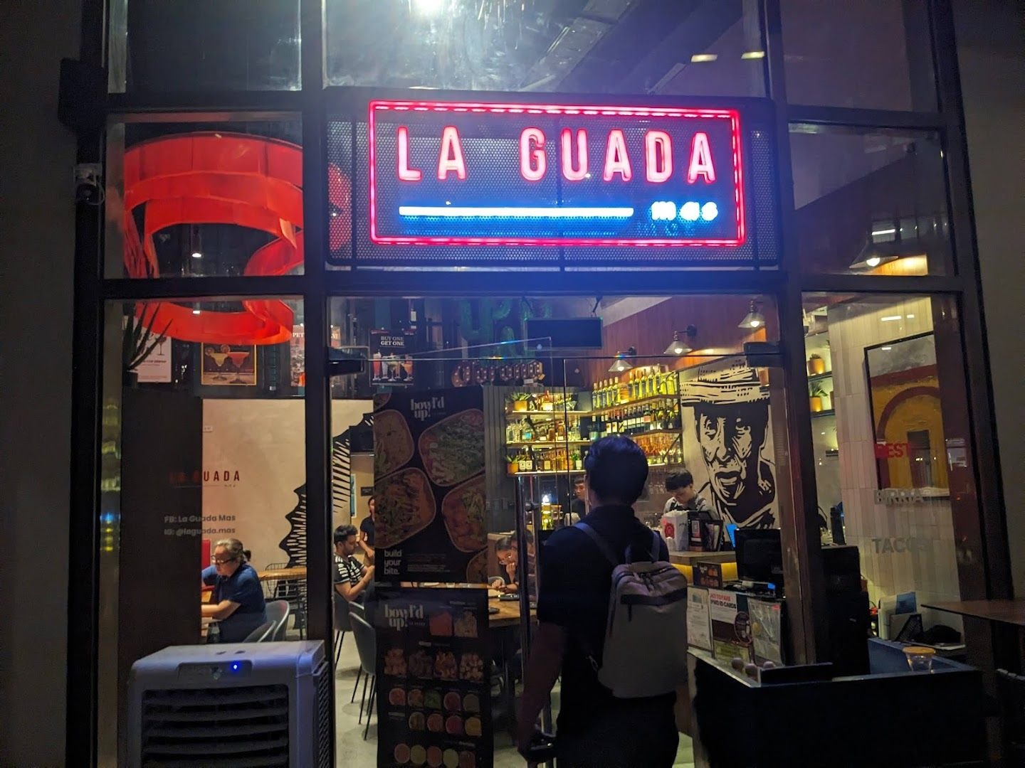 La Guada Mas restaurant entrance with neon signage at Rockwell, Makati